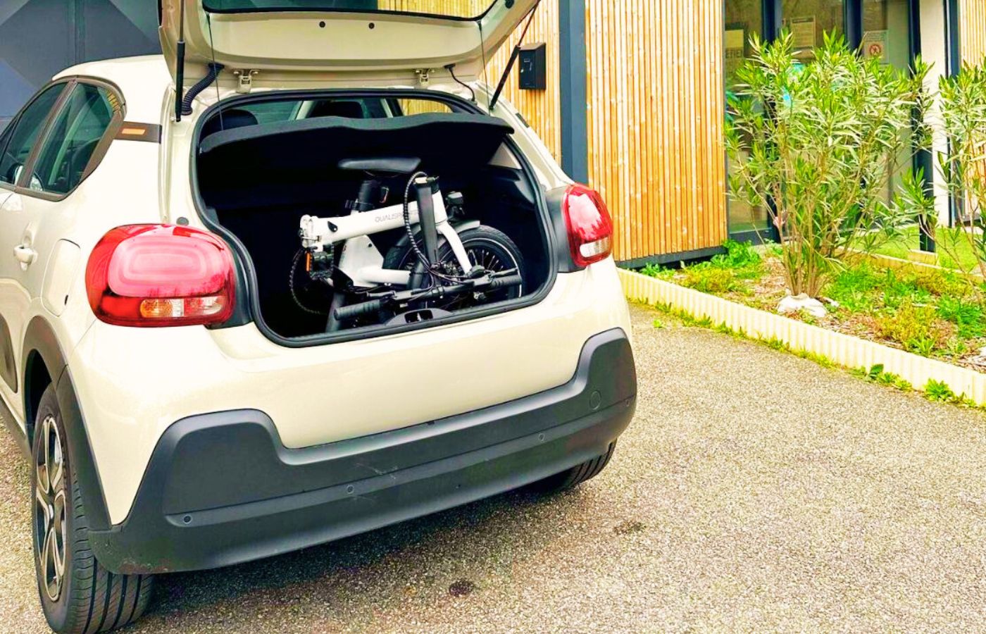 the qualisports volador folding ebike in the car truck